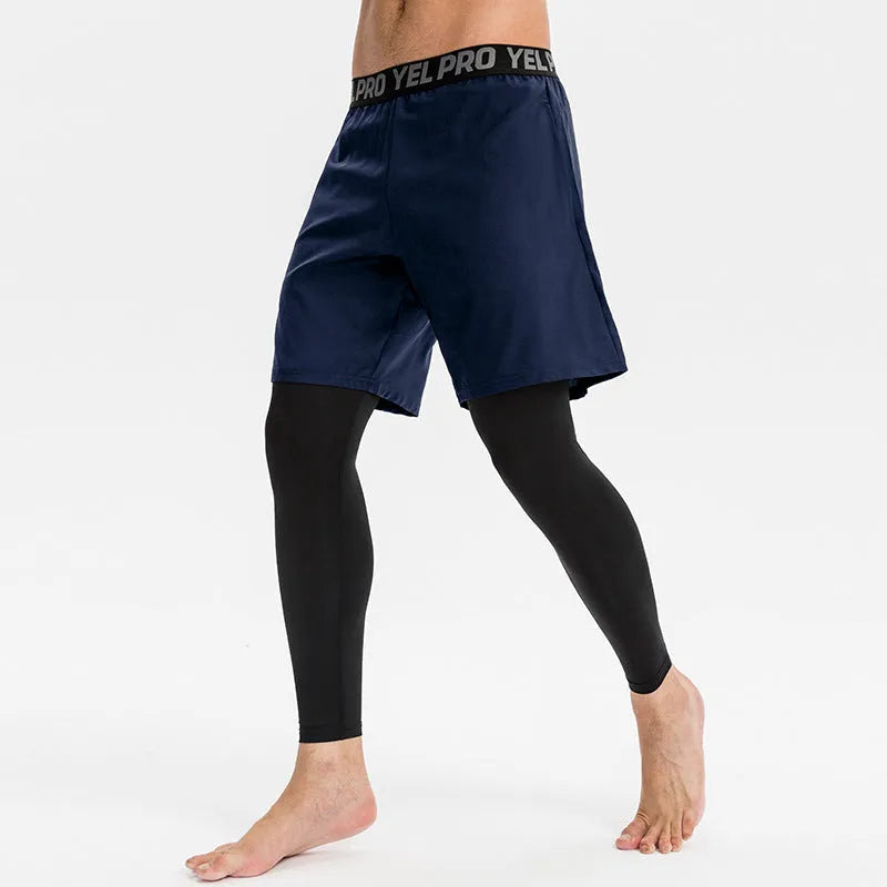 Men's grey quick-drying high elastic tight pants for fitness exercise on a model
