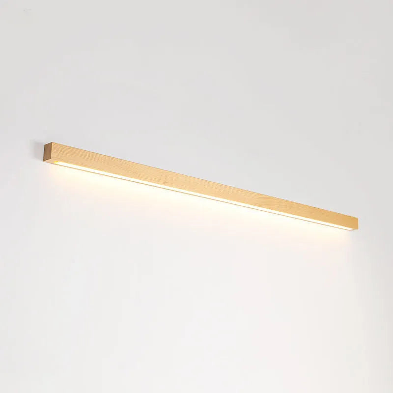 Walnut colour linear wood and acrylic wall lamp in three lengths with minimalist square profile