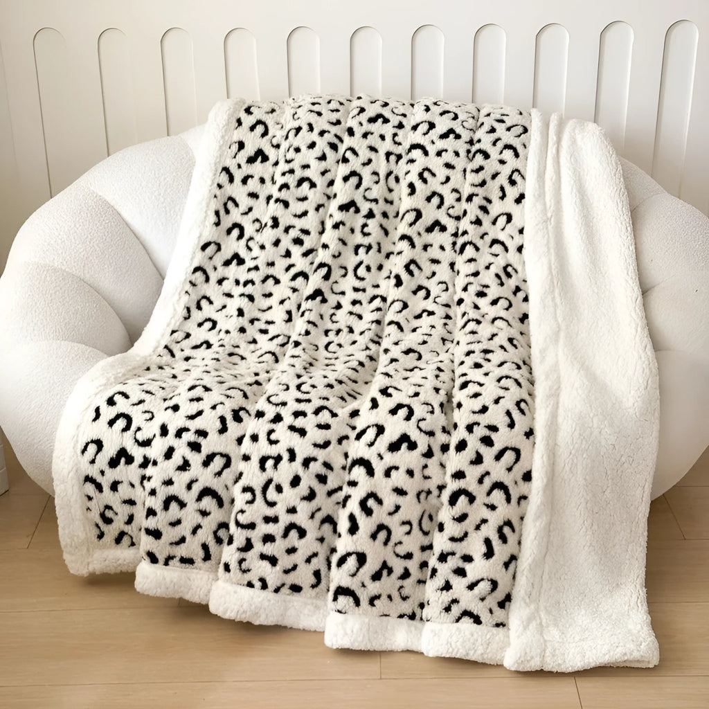 Double-layer leopard print jacquard taffeta blanket shown in camel zebra pattern