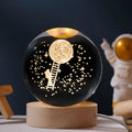 Crystal ball night light on wooden base with starry sky projection illumination