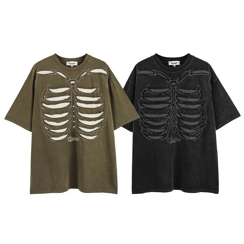 Black skull graphic short sleeve cotton T-shirt with drop shoulders on a hanger.