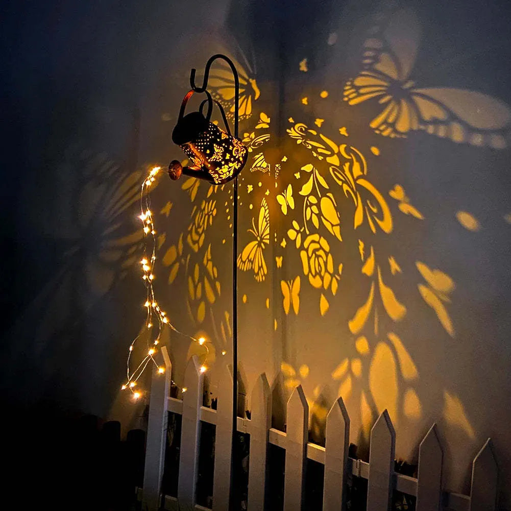 Solar garden lamp with tapered butterfly iron lantern design in warm white LED illumination