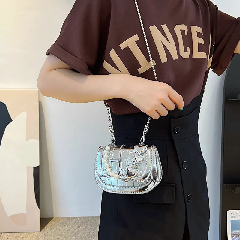 Women's silver mini tote saddle crossbody bag with mobile phone pocket and synthetic leather lining