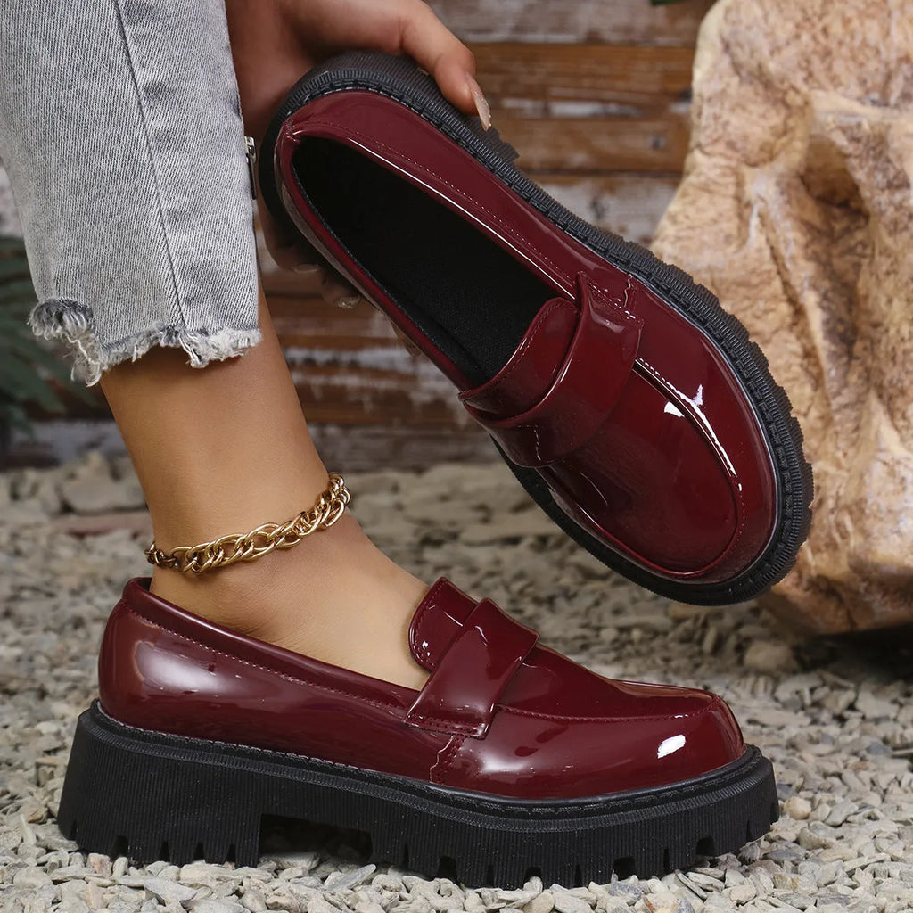 British style women's slip-on loafers with chunky platform heel in black colour
