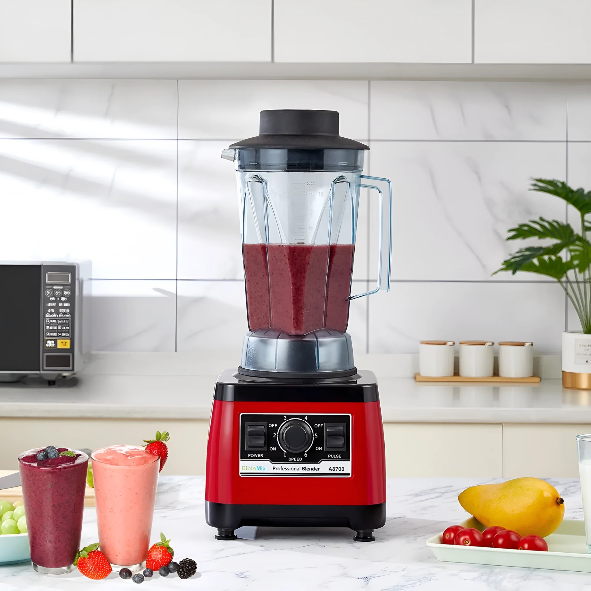 Red industrial commercial blender with 2200W motor and 2-litre container.