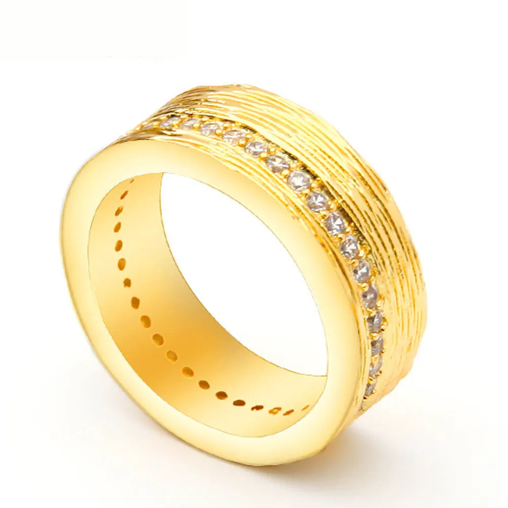 Gold geometric women's zircon ring showing angular design on copper base with electroplated finish