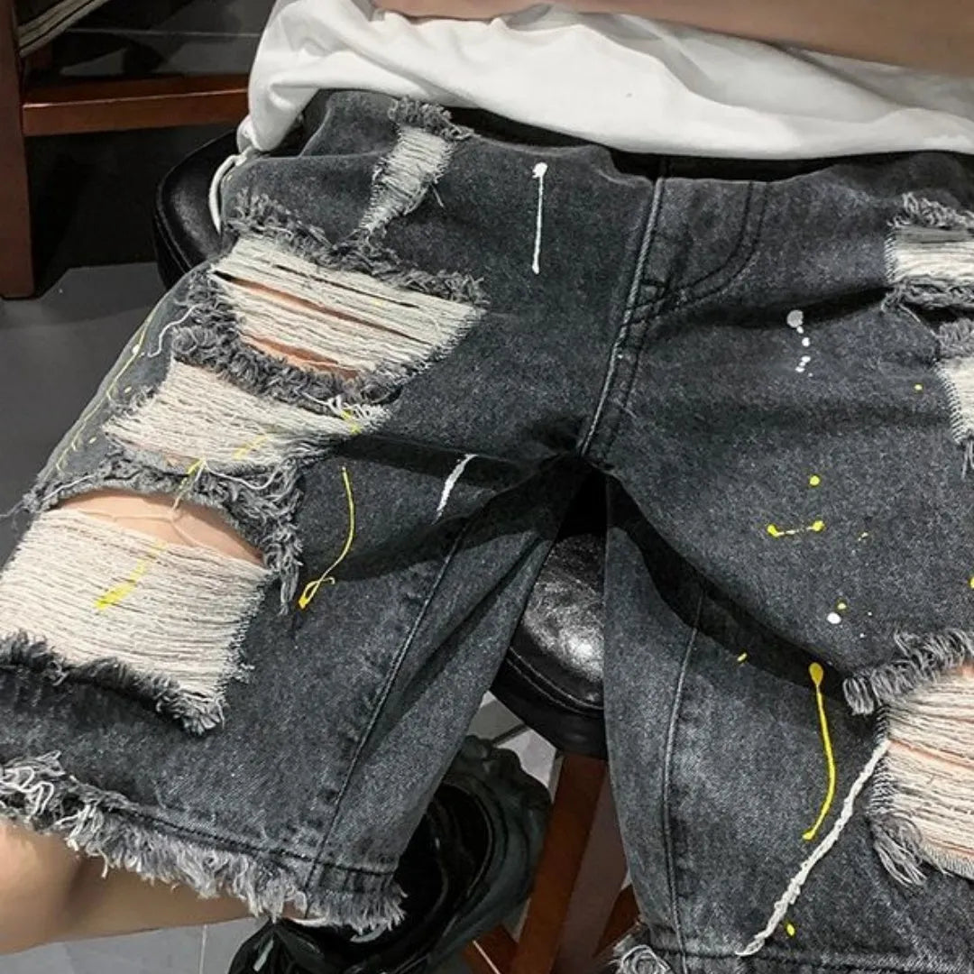Men's loose fit water washed hole denim shorts in light blue with street style summer design