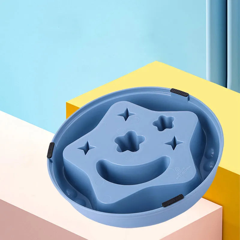 Moon star wings design slow feed dog bowl in blue with raised centre and anti-slip base