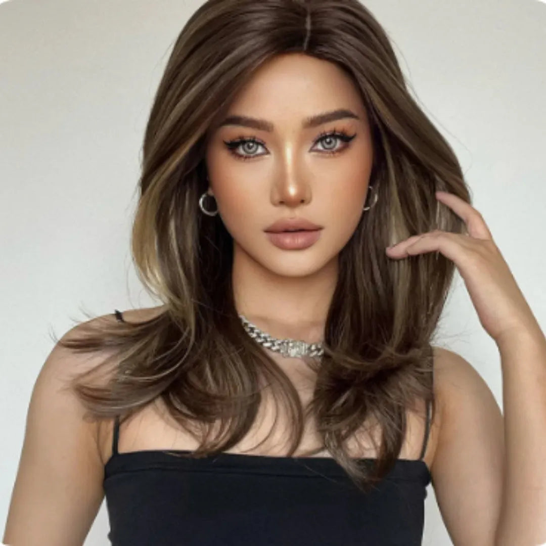 Mid-length curly synthetic wig with platinum gradient colour and long bangs