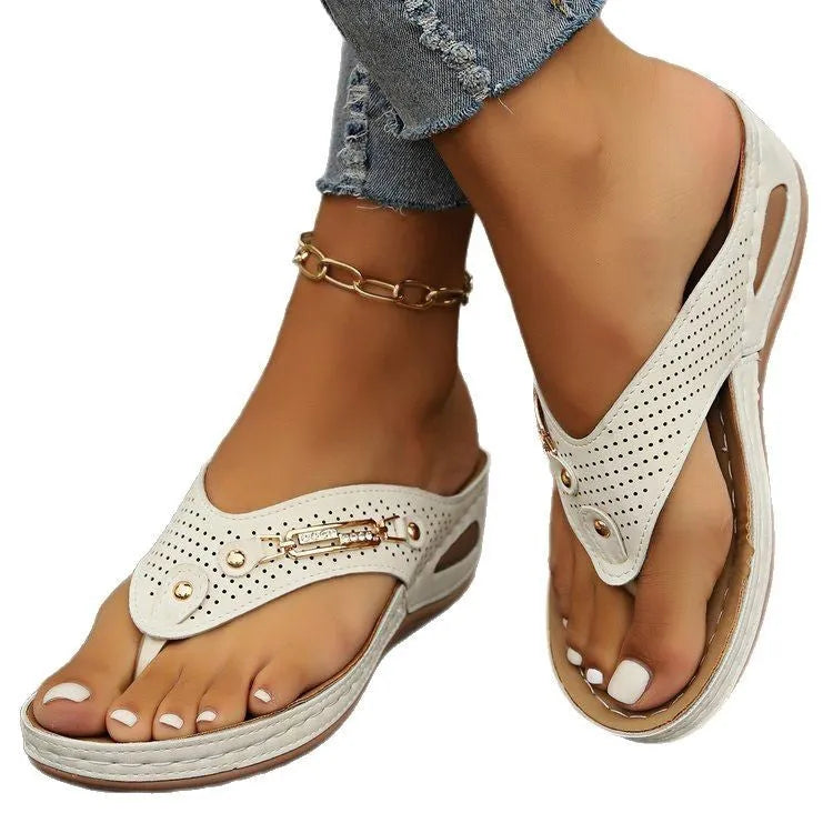Retro style women's thong flip-flop sandals in beige, shown on a white background.