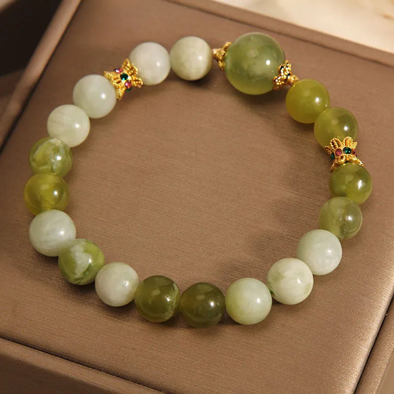 Women's bracelet made from green Xiuyan jade in a light luxury sweet Mori style.