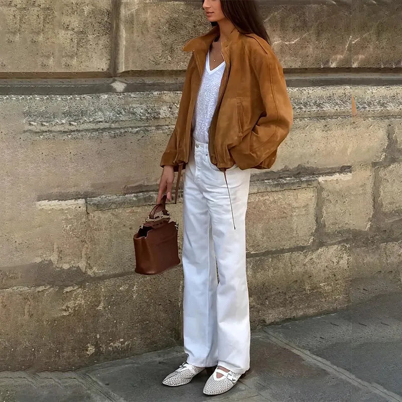 Loose fit solid colour retro jacket with long sleeves on mannequin