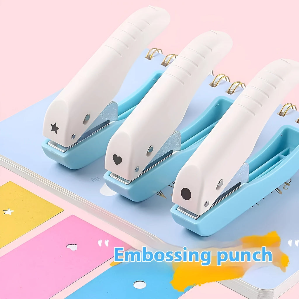 Manual handheld craft punching machine with love, star, and round dies for children's paper projects.
