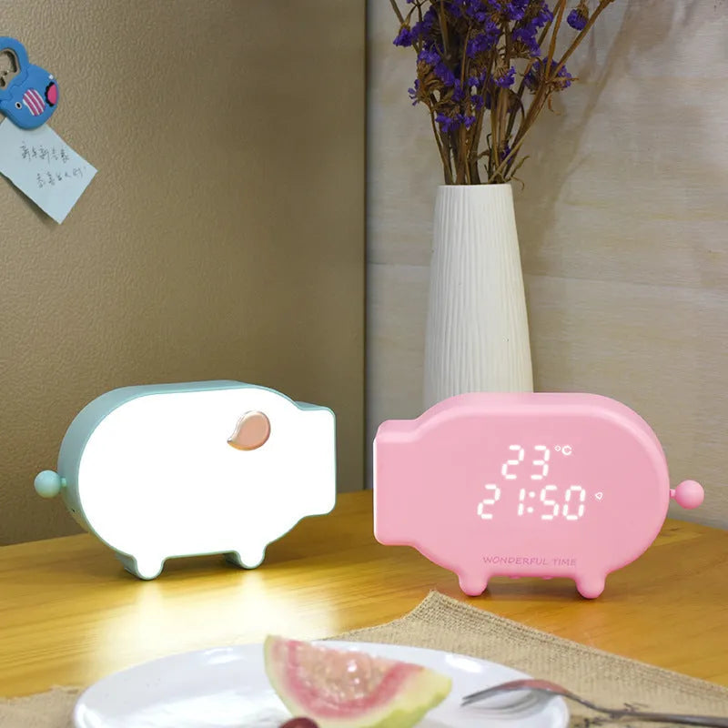 Blue multifunctional LED alarm clock showing time and temperature display with USB charging port