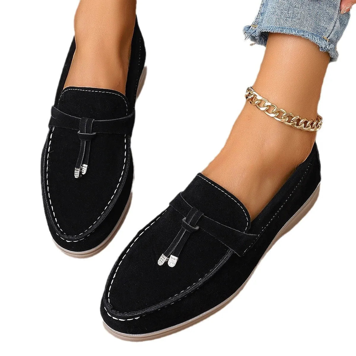 Canvas slip-on loafers in brown with round toe, rubber sole, and platform heel.