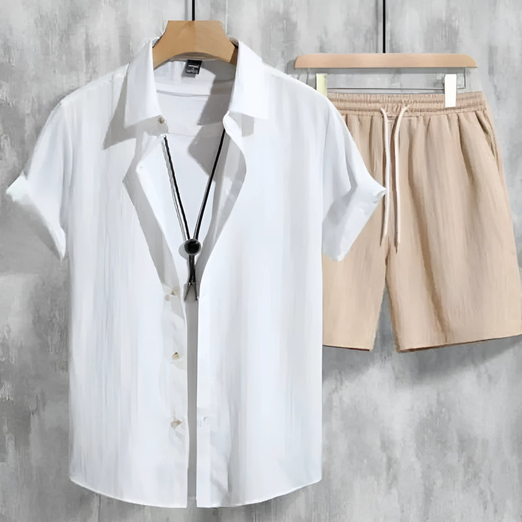 Men's Hawaiian printed short sleeve shirt and matching shorts outfit set on a hanger.