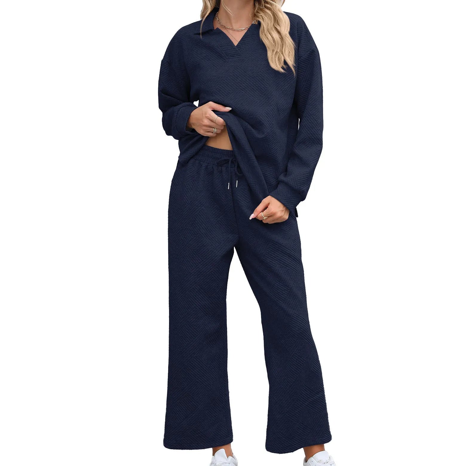Women's solid colour knitted jacquard sweater and elastic waist cropped pants suit set with geometric pattern.