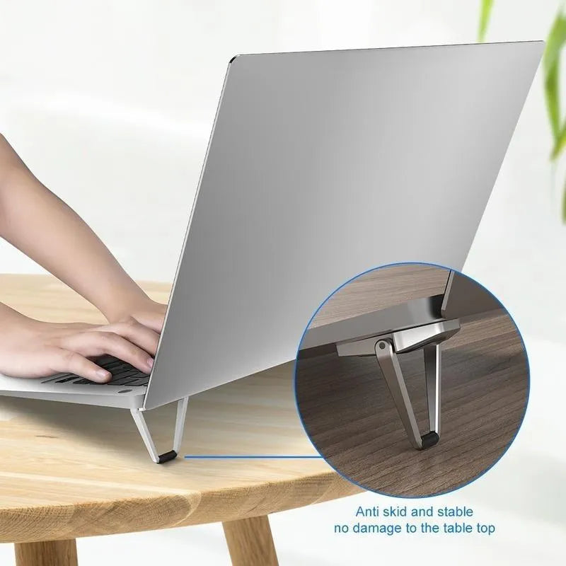 Aluminium folding laptop stand bracket in silver with compact 4.8cm design for computer cooling