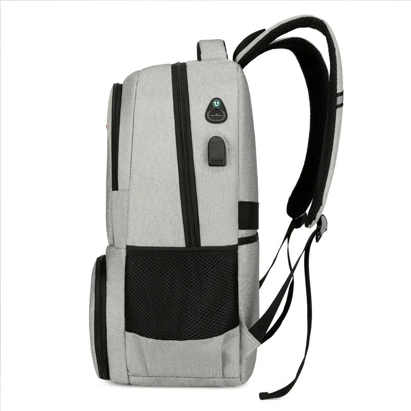 Insulated Oxford cloth backpack in light grey showing curved shoulder straps and dry-wet separation compartment