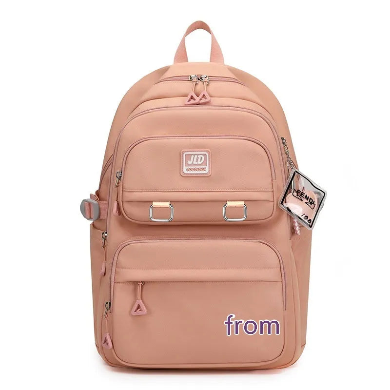 Girls' large waterproof nylon school backpack with physiological curve backplate, shown in a choice of colours.