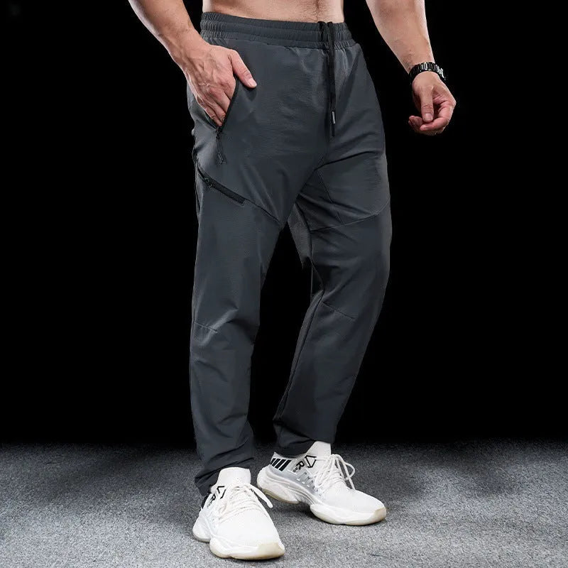 Men's waterproof quick-drying nylon workout trousers for sports and fitness activities