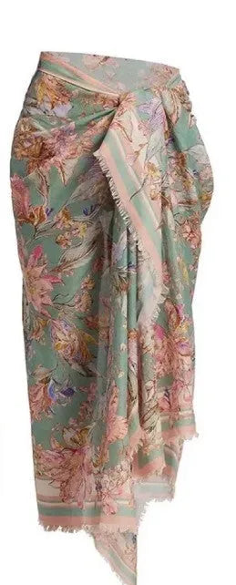 Women's floral print bikini set with matching skirt in creamy-white beige colour