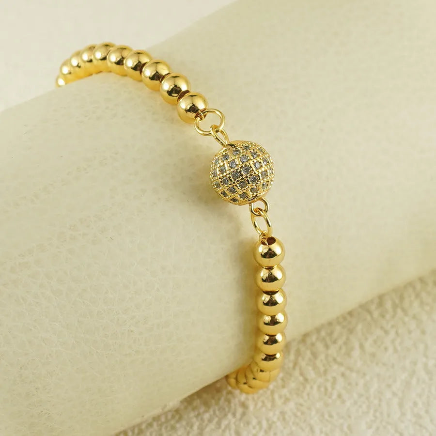 Women's copper bracelet with heart shape design, single ball zircon, and Arabic style elements