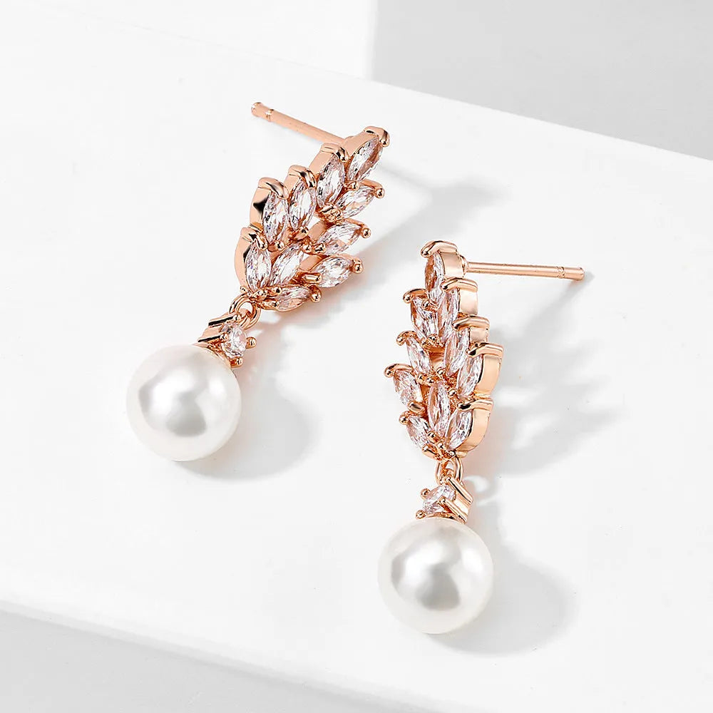 Geometric pearl earrings with micro inlaid zircon detailing and floral design in metallic plating