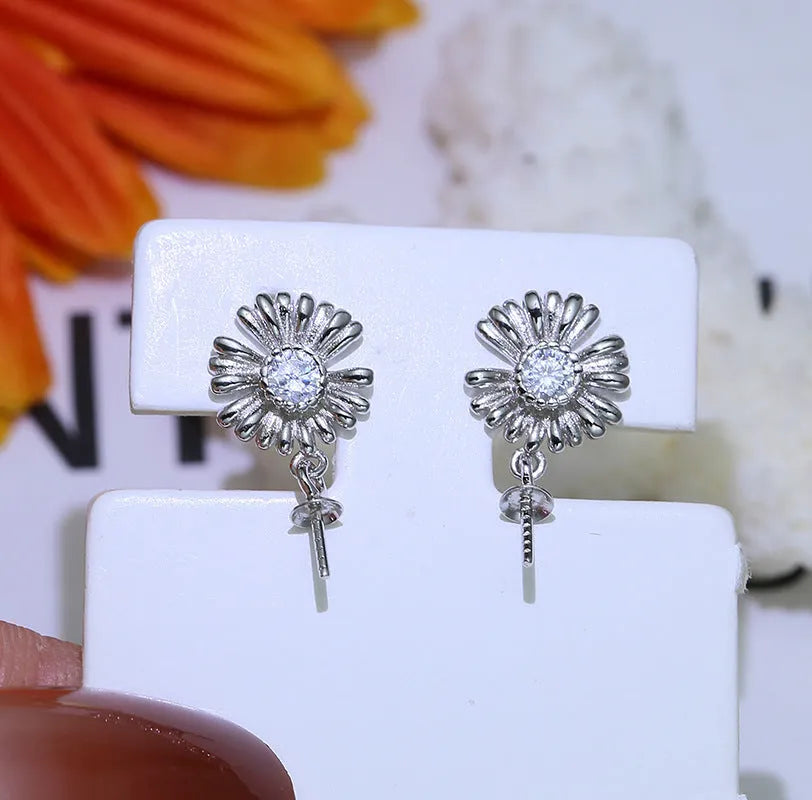 Baroque flower-shaped S925 sterling silver earring holder ring with a pair of drop earrings.