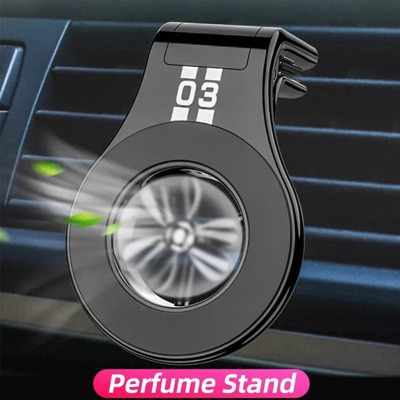 Black magnetic car phone holder attached to vehicle air vent with smartphone mounted