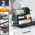 White double-layer kitchen storage rack with removable draining feature on countertop