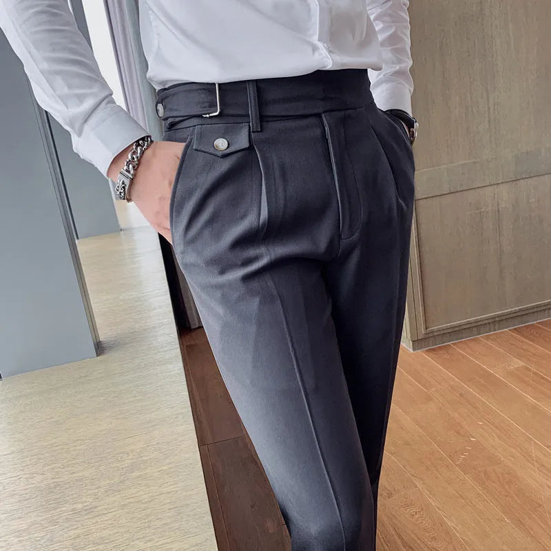 Straight-leg casual trousers in a neutral colour on a hanger, showing the simple fit and polyester fabric.