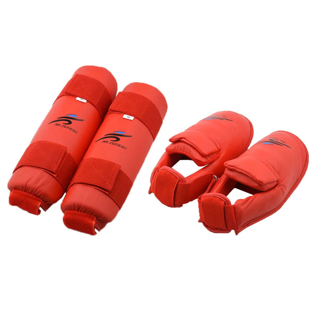Karate protective gear set showing red helmet, boxing gloves and leg guard for martial arts training