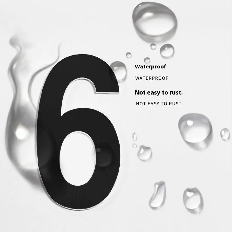 Black stainless steel sticky house number measuring 7.5cm with adhesive backing for waterproof door signage.