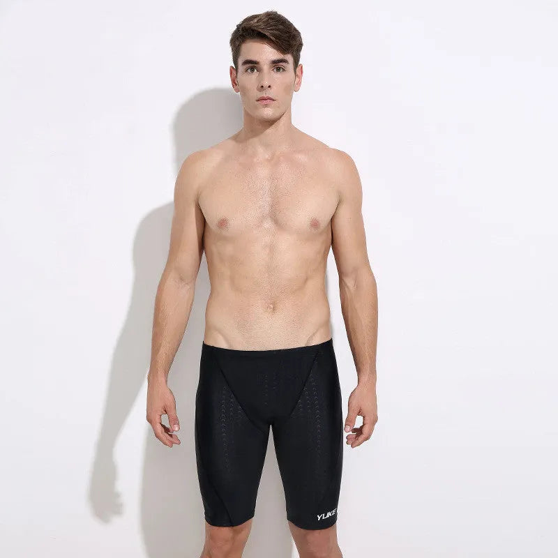 Men's black polyester swimming set with anti-fog goggles, waterproof cap, ear plugs, and swim bag