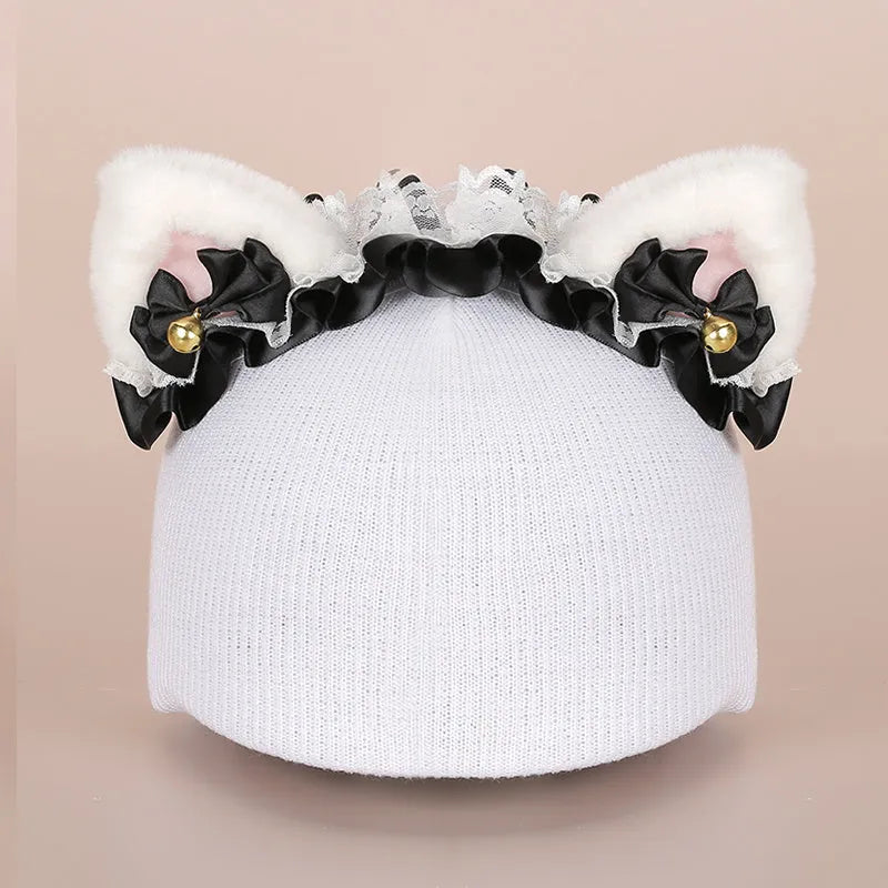 Plush fabric cartoon character decoration cover on a ski helmet
