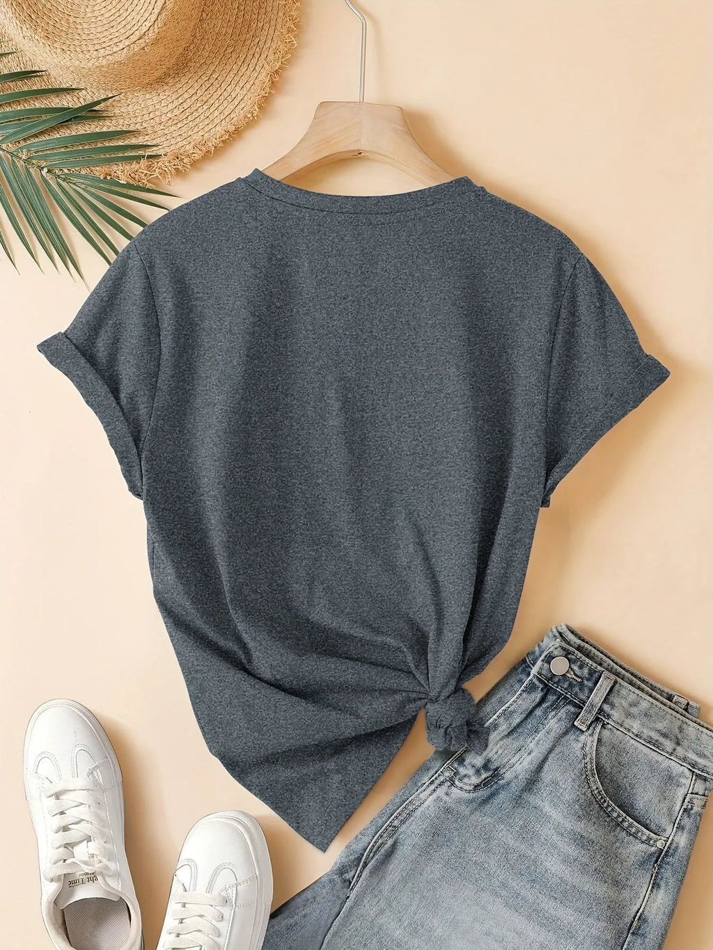 Women's art retro print pure cotton T-shirt in blue on a hanger