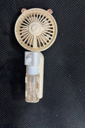 A personalised plastic desk fan with USB charging port, shown in one of five colour options.