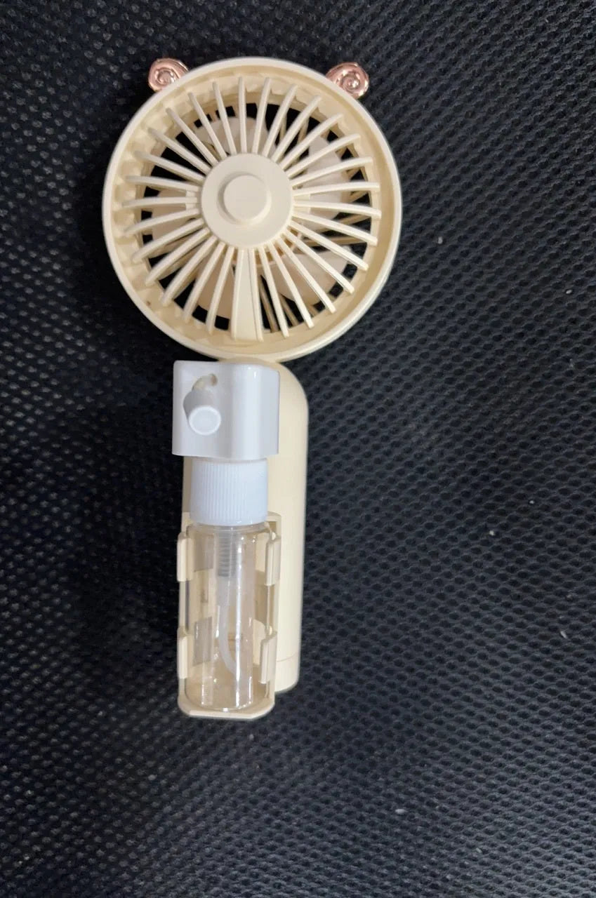A personalised plastic desk fan with USB charging port, shown in one of five colour options.