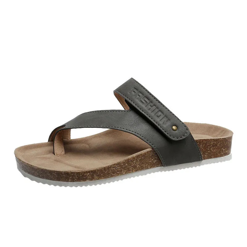 Solid colour thick-soled flat toe ring flip-flops on a white background.