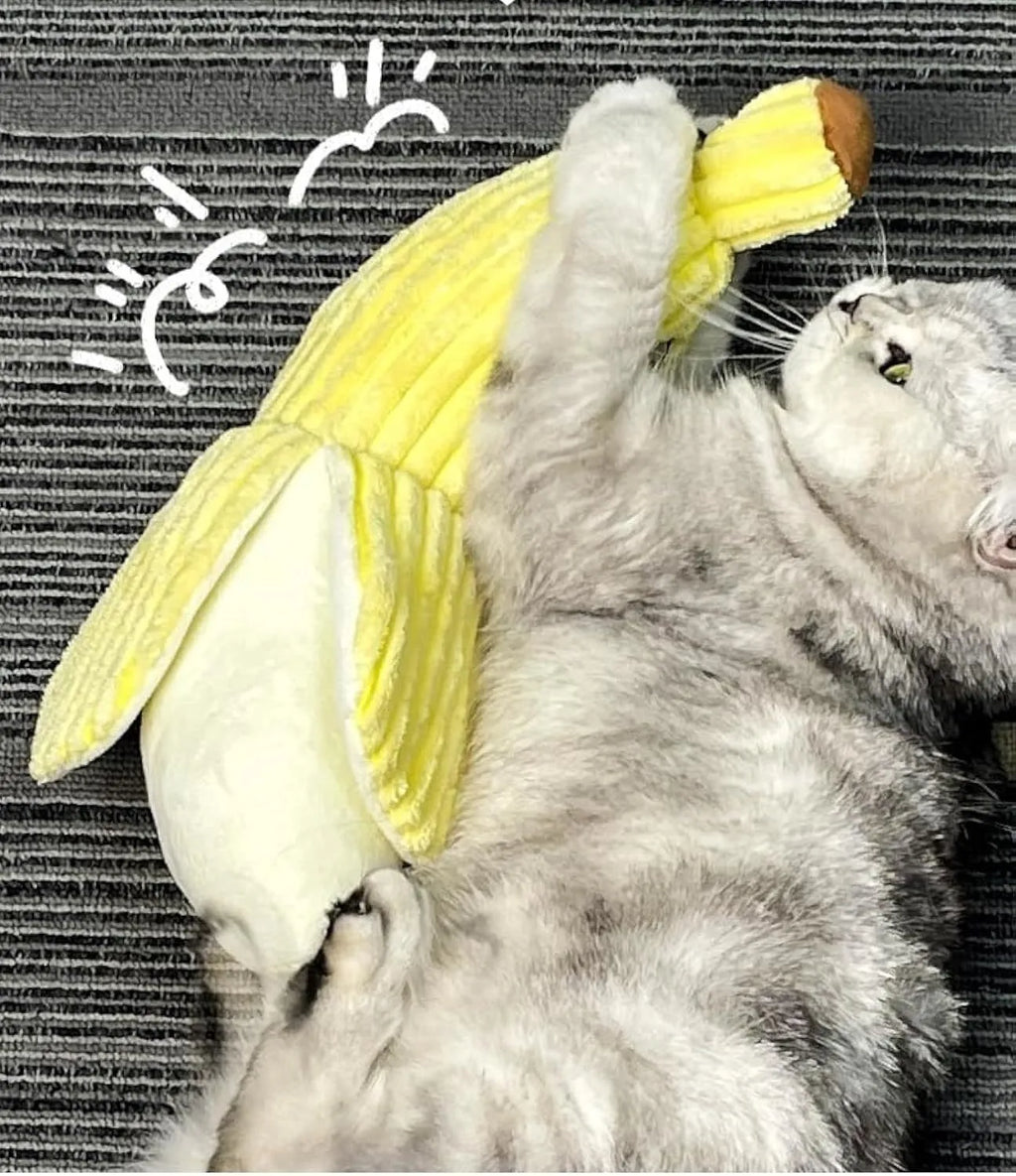 Yellow banana-shaped cat toy with plush fabric and crinkle paper inside.