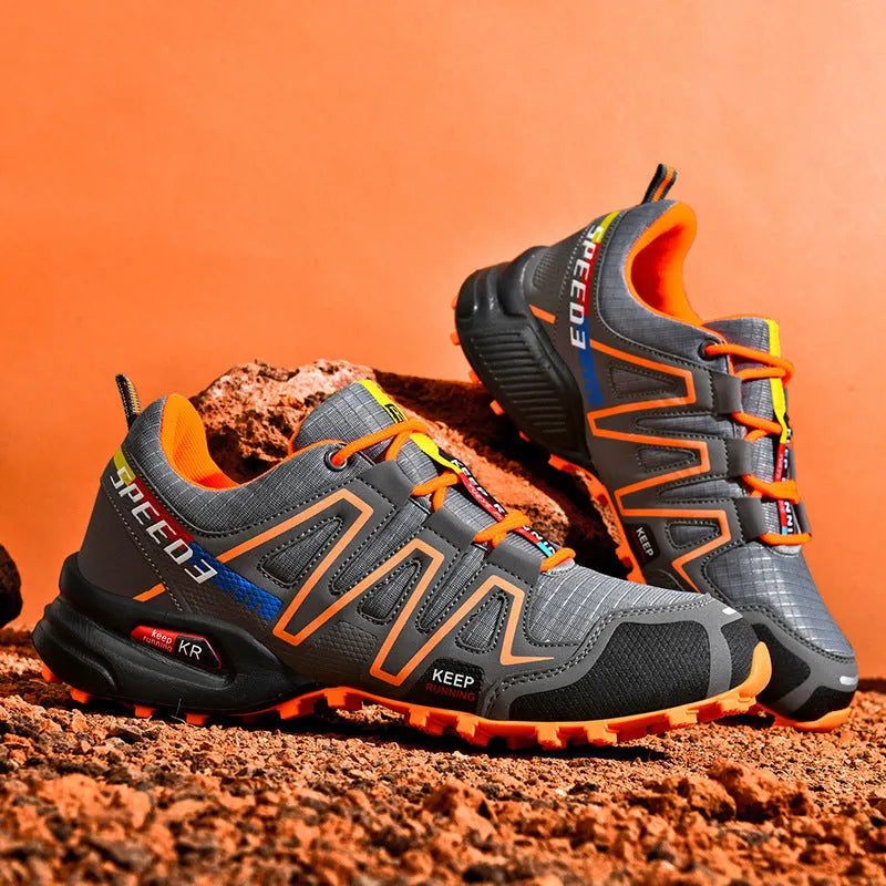 Men's gray orange plus size casual shoes with low-top design and rubber sole.