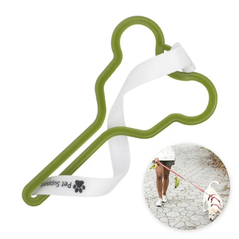 Dog poop bag holder with fixed clip and adjustable Velcro fastener on a leash.