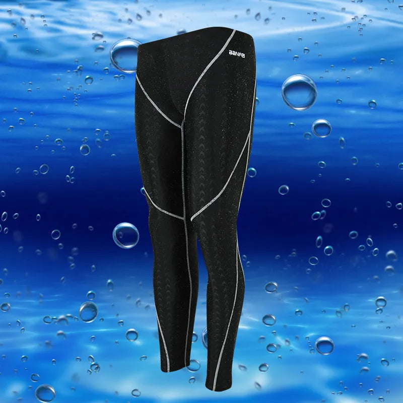 Men's nylon cropped swimming trunks in black with line pattern detail