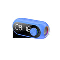 Portable mini Bluetooth speaker with digital clock display in black, white, or blue colour.