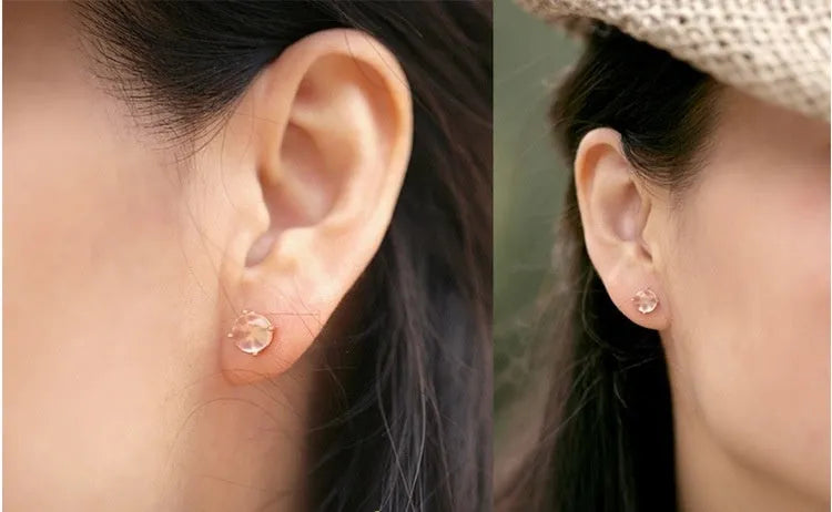 Rose gold drop shape stud earrings with synthetic quartz crystal inlay