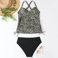 Women's black high waist backless nylon bikini set for swimming sports on a mannequin.