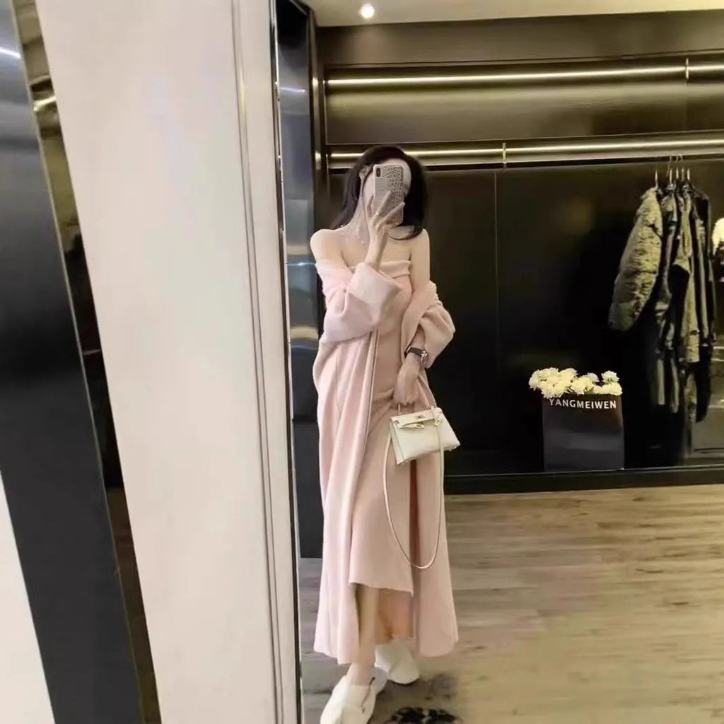 Women's grey knitted cardigan dress and coat suit set with long skirt and flocking detail.