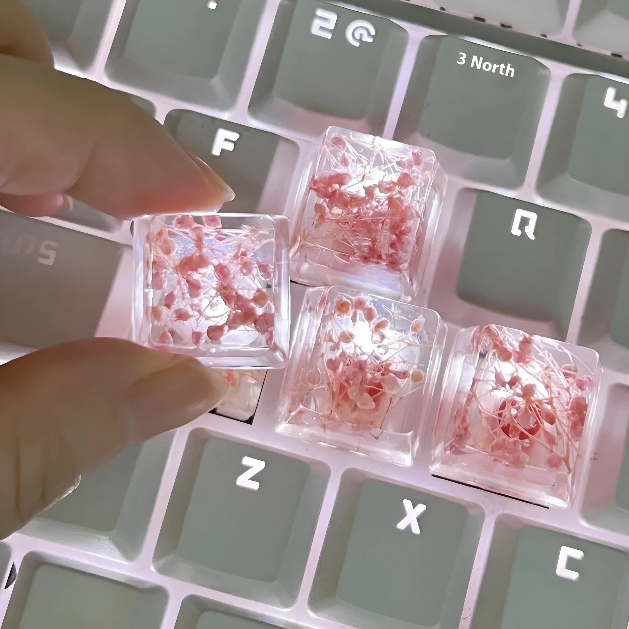 Transparent resin mechanical keyboard keycap with starry sky design in four colour options