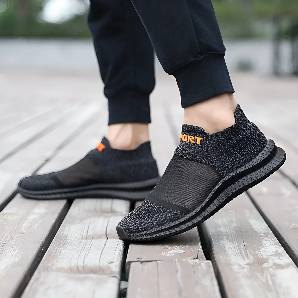 Casual beige Flyknit sports socks shoes with lace-up front and round toe on a neutral background.